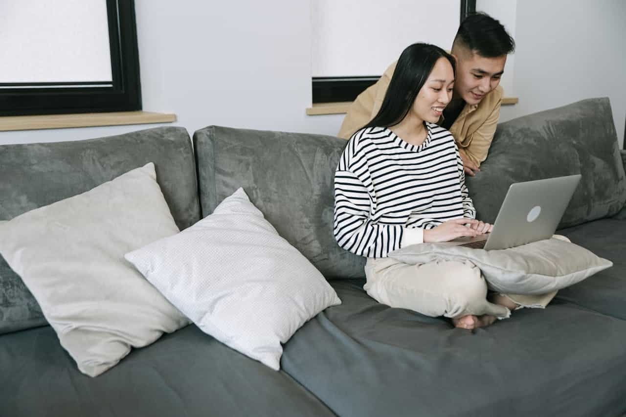 Couple attending online couples therapy session from home in San Francisco