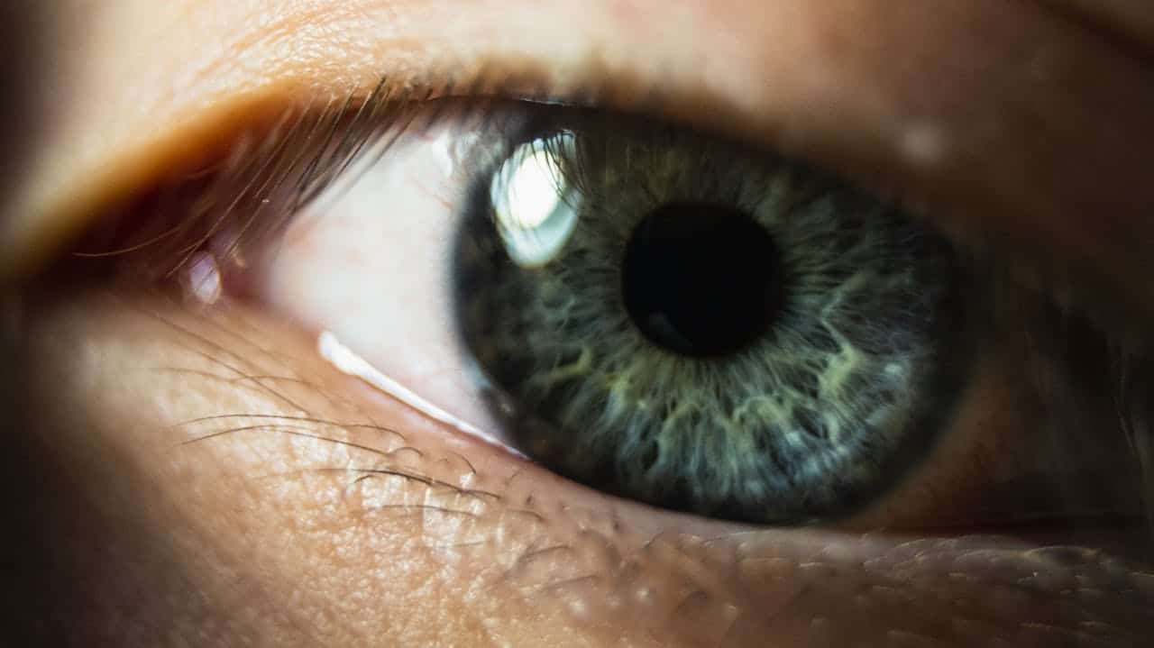 Close-up of eye representing bilateral stimulation used in EMDR vs somatic therapy for trauma