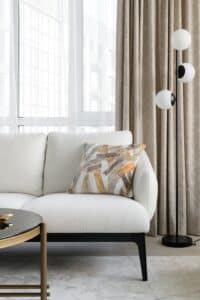 Comfortable sofa in a bright therapy room, inviting space designed for safety and emotional ease