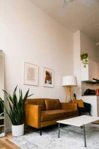 Comfortable sofa in a bright therapy room, inviting space designed for safety and emotional ease