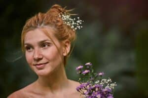 a-woman-with-a-flower-in-her-hair