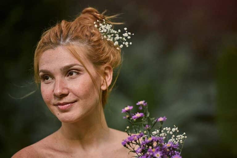 a-woman-with-a-flower-in-her-hair
